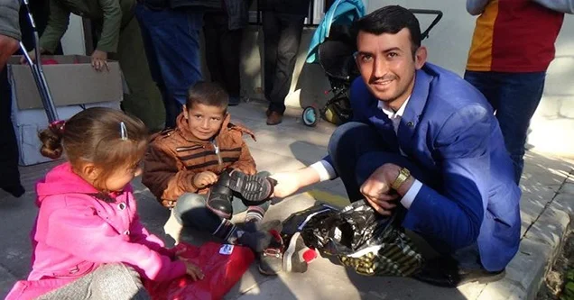 Yağışlar öncesi engelli çocuklara bot yardımı