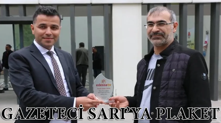 Edessa TV’den başarılı gazeteciye plaket